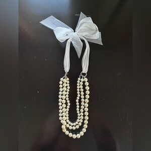 Elegant Pearl Necklace with Ribbon